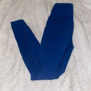 Lululemon leggings size 4. Royal blue with sheer polka dots along each leg.